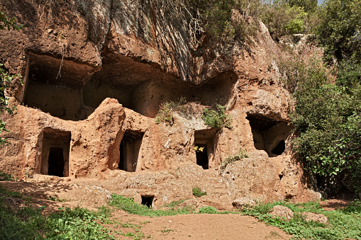 Viterbo, Lazio, Italy: Etruscan necropolis of San Giuliano, the ancient porch tombs, 2500 years old, carved in the tufa rock in Marturanum regional park, near the towns of Barbarano Romano and Blera