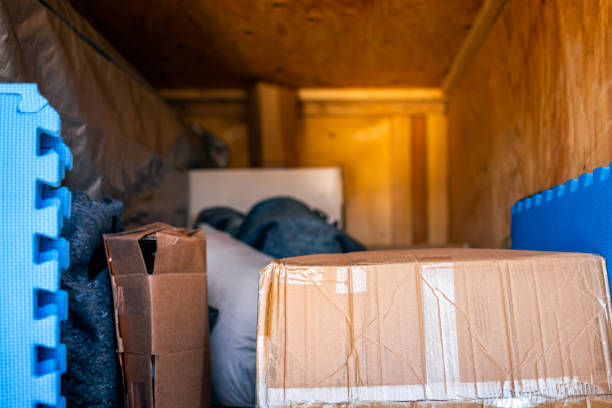 istock Open transportation trailer pod for loading home delivery with furniture pads when moving or relocating with belongings in boxes 1446067986