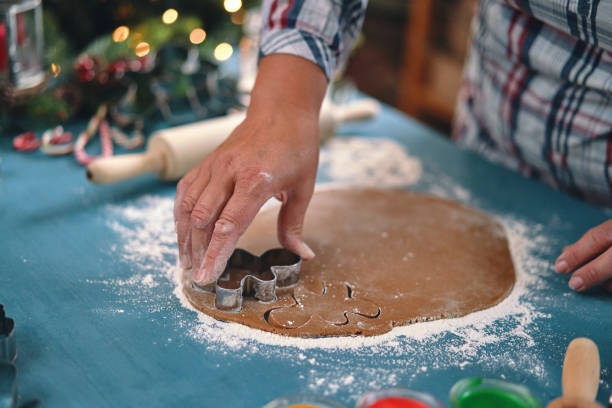 istock Preparing Gingerbread Christmas Cookies in Domestic Kitchen 1446068698