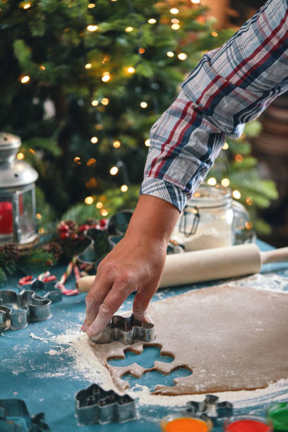 istock Preparing Gingerbread Christmas Cookies in Domestic Kitchen 1446068726