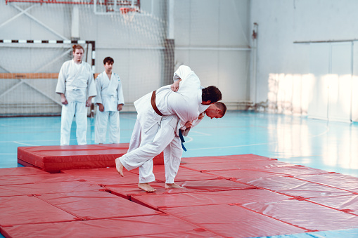 Harai Goshi Throw Done On Mats In Judo Dojo