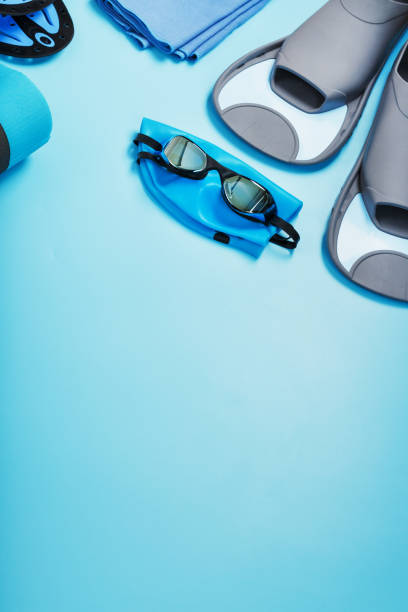 istock Set for training and learning to swim in the pool and open water on a blue background 1446073907