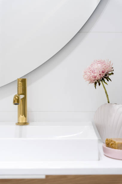 istock Golden bathroom tap, close-up 1446074083
