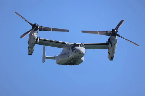 The V-22 Osprey aircraft is a joint-service, medium-lift, multi-mission tilt-rotor aircraft developed by Boeing and Bell Helicopters.   As such it is capable of vertical take-o and landings.