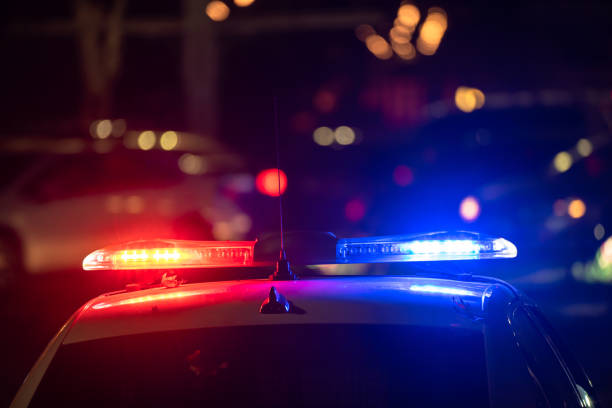 Police car with flashing lights on stock photo