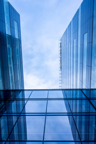 istock Reflections in glass facade of an office high rise.. 1446084783