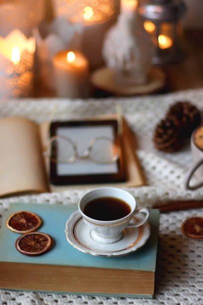 istock Tea, Books, Tablet, Cookies and Candles 1446086173
