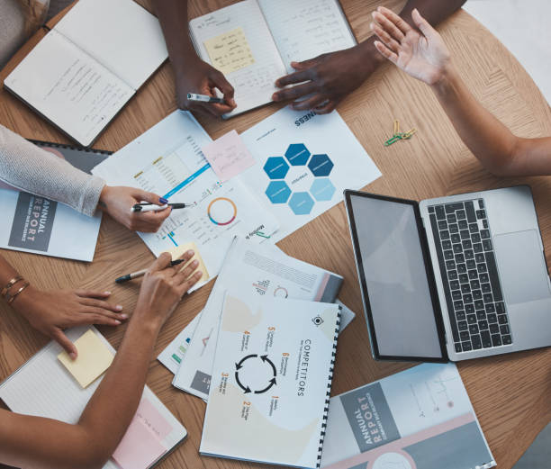 istock Marketing teamwork people planning strategy, documents of analytics and top view of group working together. Business report in office research, budget collaboration and corporate competition analysis 1446087463