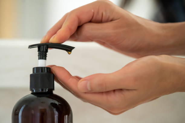 istock Girl washes her hands with soap. 1446087548