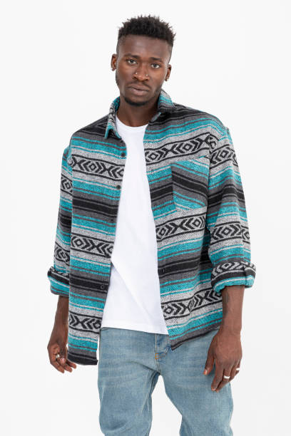 istock Black man wearing winter shirt against white background. 1446089446