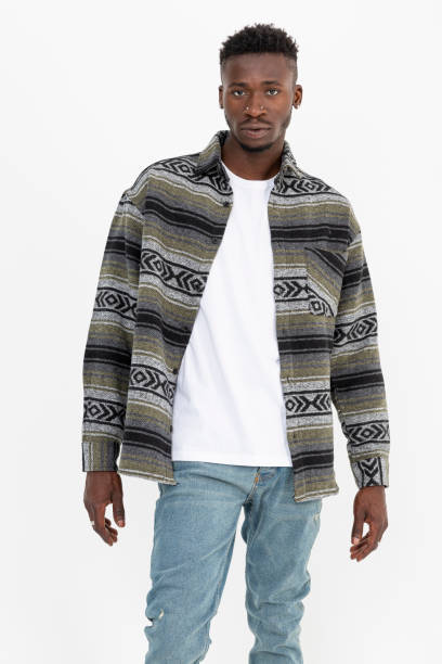 istock Black man wearing winter shirt against white background. 1446089541