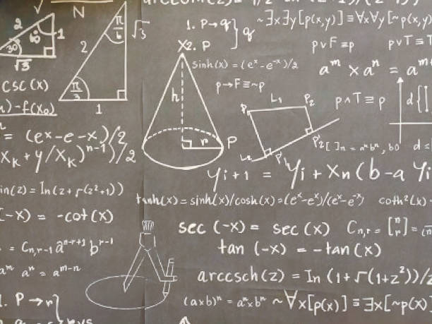 istock Mathematical formulas and geometric shapes are painted on the school blackboard throughout the frame 1446089595