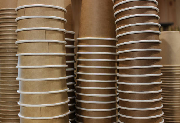 istock Stacked Paper Tea Cups Texture Background Stock Photo 1446089696