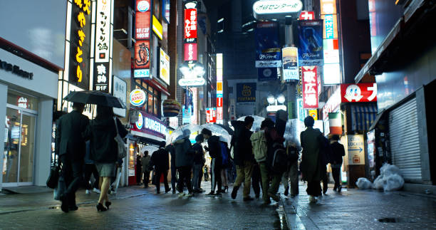 istock Shibuya Pedestrians on Rainy Night 1446089949