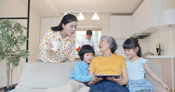 istock Multi Generation Chinese Family Relaxing at Home 1446090234