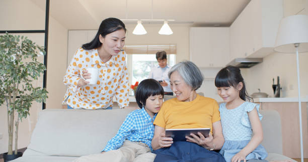 istock Multi Generation Chinese Family Relaxing at Home 1446090243