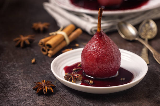 Poached Pears in Red Wine for the Holidays stock photo