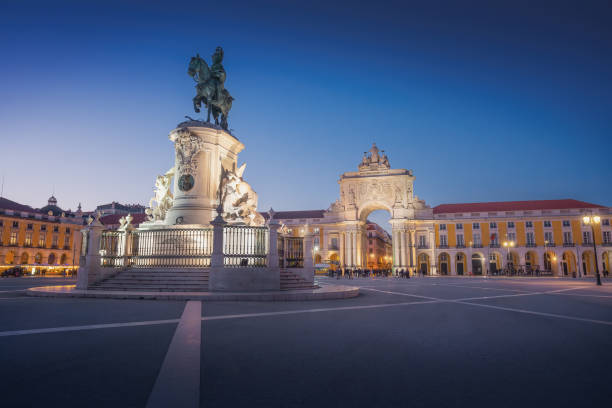 istock Praca do Comercio Plaza with King Dom Jose I Statue and Rua Augusta Arch at night - Lisbon, Portugal 1446091676