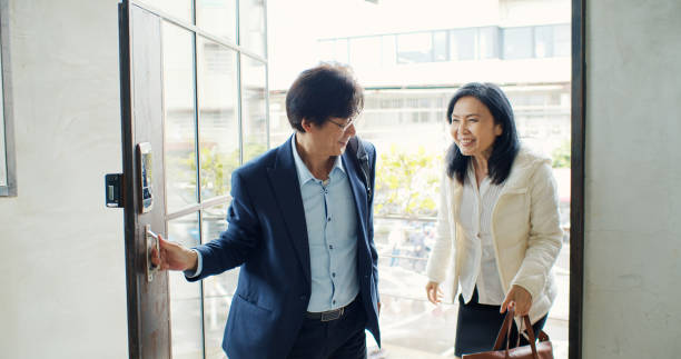 istock Asian Freelancers Arriving in Coworking Space 1446092891