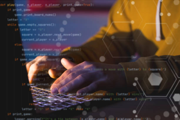 istock Man works on a laptop online, hands closeup. 1446096129