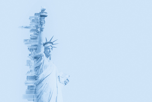 Double exposure image of the Statue of Liberty and new york skyline