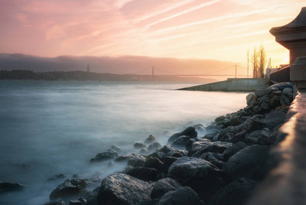 istock Tagus River (Rio Tejo) at sunset - Lisbon, Portugal 1446096382