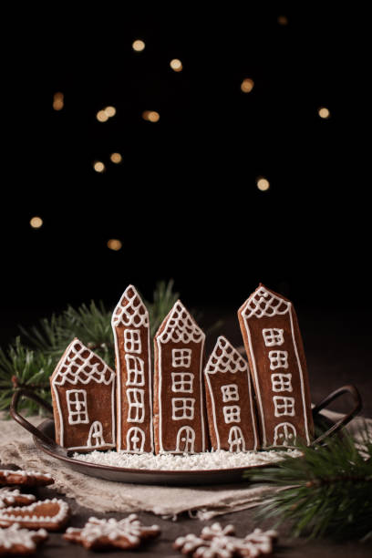 istock Hand made christmas gingerbread cookies with decoration 1446097487