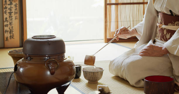 istock Japanese Tea Ceremony Host Pouring Water Into Bowl 1446100586