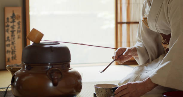 istock Japanese Tea Ceremony Host Measuring Out Powder 1446100592