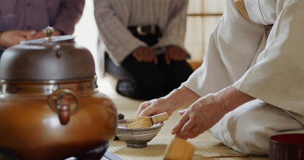 istock Japanese Tea Ceremony Host with Guests in Background 1446100625