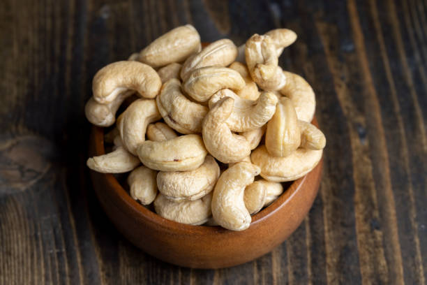 istock Hard roasted and peeled cashew nuts on the table 1446106121
