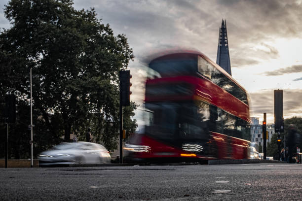 istock London double decker bus with the Shard 1446106928