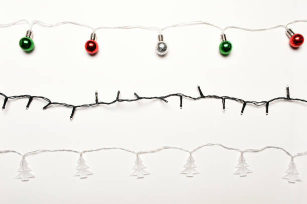 istock Christmas lights on the white background 1446108020