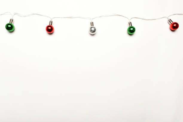 istock Christmas lights on the white background 1446108085