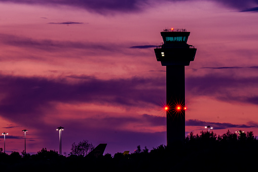 Airport control tower at dusk