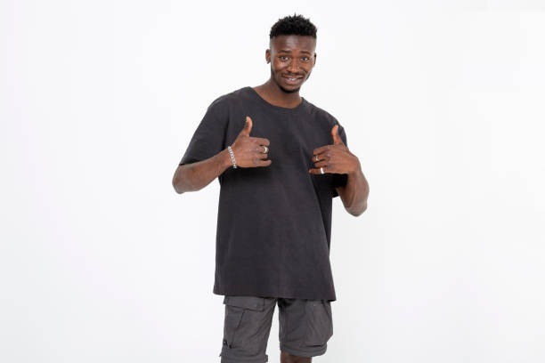 istock African descent young black man with gray t-shit against white background. 1446115604