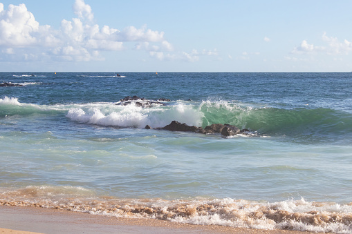 Sea wave at Praia da Barra, Salvador, Bahia, Brazil