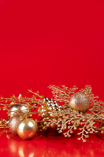 Christmas ornaments on branches of an evergreen tree