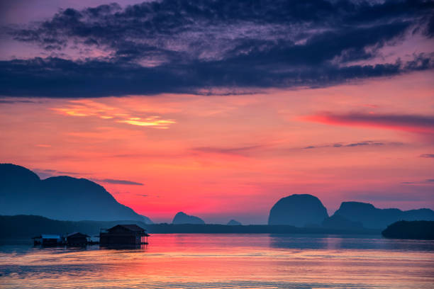 Beautiful sky in the morning during sunrise at fisherman village of Sam-Chong-Tai, Phang-Nga province, Thailand. Beautiful sky in the morning during sunrise at fisherman village of Sam-Chong-Tai, Phang-Nga province, Thailand. Sam Chong Tai village the famous tourist attraction in south of Thailand. phang nga province stock pictures, royalty-free photos & images