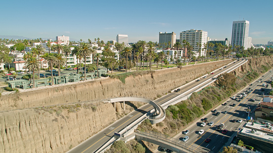 Aerial establishing shot of Santa Monica, California on a sunny day. Authorization was obtained from the FAA for this operation in restricted airspace.