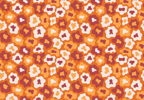 Hippie leopard seamless pattern by orange colors vector illustration Hippie leopard seamless pattern by orange colors vector illustration. Monochrome orange and red motley abstract pattern with flowers vector red camouflage pattern stock illustrations