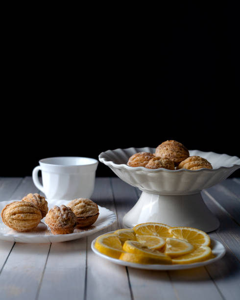 istock On the table are cookies, lemons and a mug. 1446134156