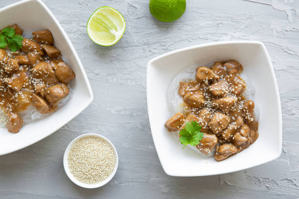 istock Thai noodles with meat and cilantro on grey concrete background. 1446135718