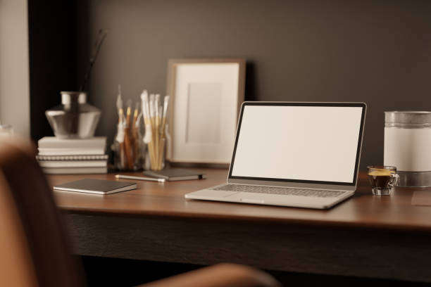 istock Modern creative office desk workspace with laptop, painting tools and decor on wood table 1446140406