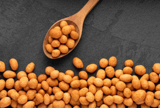 istock Arachis hypogaea - Organic Japanese peanuts in the spoon 1446140778