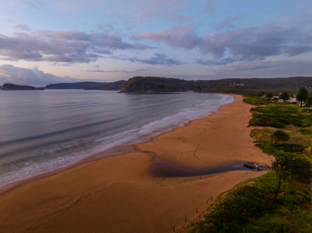 istock Aerial sunrise seascape with rain clouds 1446151285