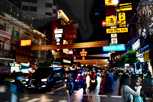 Traffic on the crowded Yaowarat road at night, the main street of Bangkok's Chinatown, Thailand