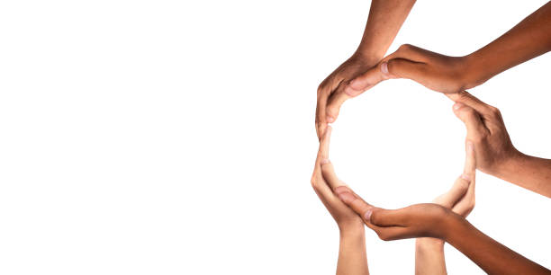 istock Symbol and shape of circle created from hands.The concept of unity, cooperation, partnership, teamwork and charity. 1446155330