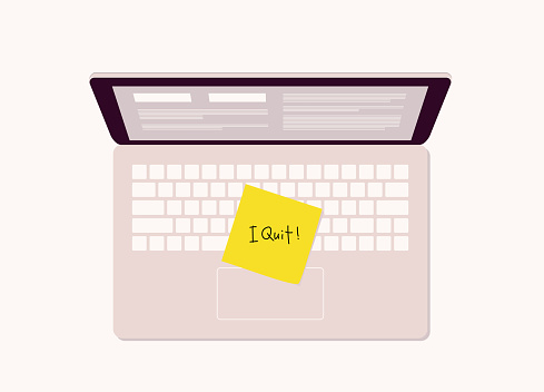 Top View Of A Opened Laptop With Yellow Sticky Note “I Quit” On Keyboard. Isolated On Color Background.