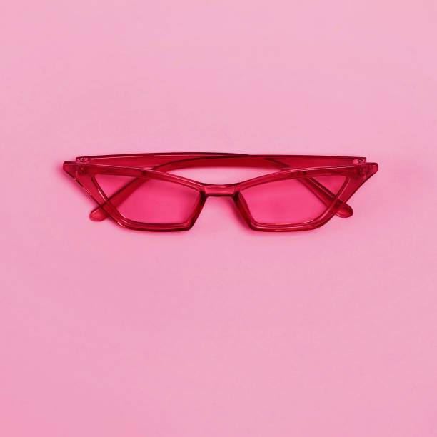 istock Stylish bright magenta sunglasses on pink 1446161253